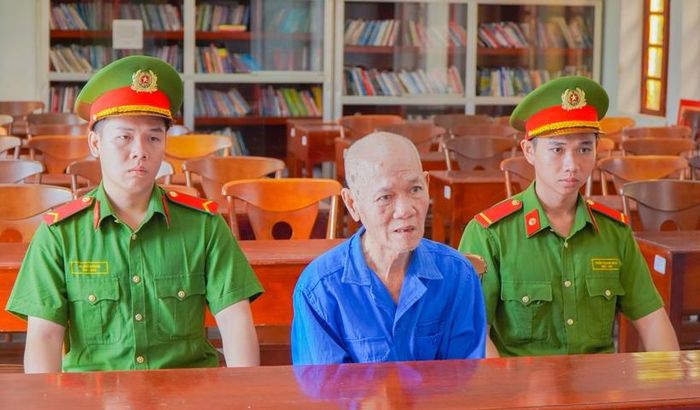 Đối tượng Trần Hoàng Minh tại Cơ quan Công an. (Ảnh:CA)