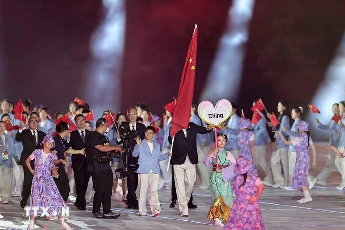 Đoàn thể thao Trung Quốc diễu hành trong lễ khai mạc Đại hội Thể thao châu Á lần thứ 20 (ASIAD 20) tại thành phố Nagoya, Nhật Bản ngày 19/9/2026. (Ảnh: THX/TTXVN phát)