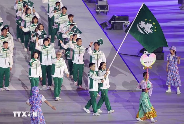 Đoàn thể thao Macao (Trung Quốc) diễu hành trong lễ khai mạc Đại hội Thể thao châu Á lần thứ 20 (ASIAD 20) tại thành phố Nagoya, Nhật Bản ngày 19/9/2026. (Ảnh: THX/TTXVN phát)