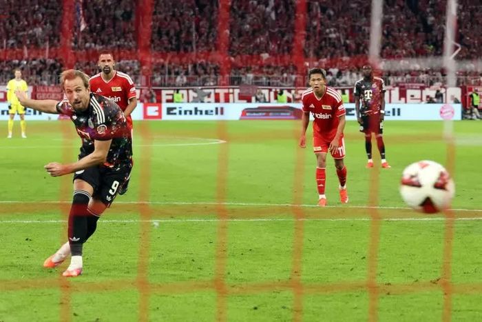 Kane đã đạt được cột mốc đó sau khi lập cú đúp vào lưới Union Berlin. Ảnh: AFP