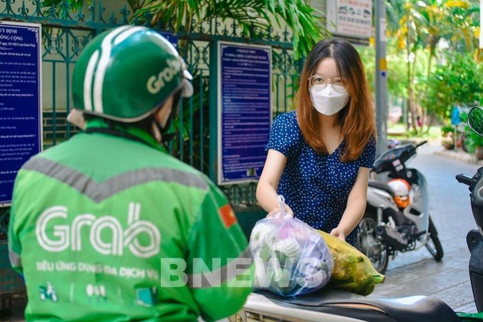 Một trong nhiều dịch vụ của Grab Việt Nam. Ảnh: BNEWS/TTXVN phát