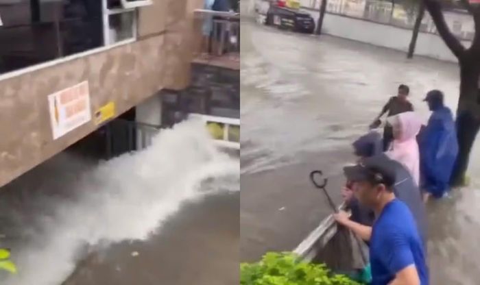 Nước tràn vào tầng hầm tại chung cư tại phường Thành Vinh, người dân nhanh chóng di dời tài sản.