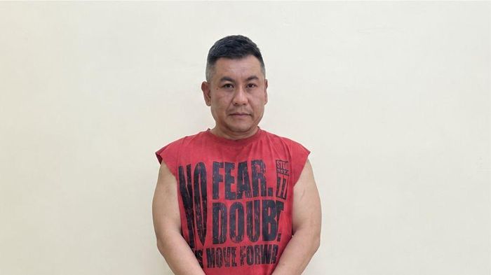 Hoàng "Nato" tại cơ quan điều tra. Ảnh: CACC