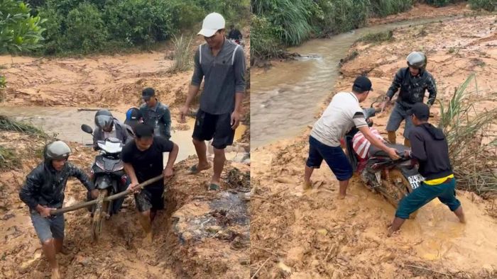 Người dân thôn Cát Trỉa khiêng xe giúp cho giáo viên trên địa bàn. Ảnh: CTV