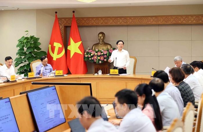 Phó Thủ tướng Hồ Quốc Dũng chủ trì họp với một số bộ, ngành về dự án Luật đất đai (sửa đổi). Ảnh: An Đăng - TTXVN. Ảnh: An Đăng - TTXVN