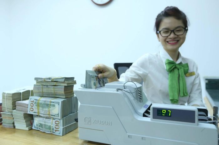 Ngân hàng Nhà nước linh hoạt điều tiết thanh khoản, tạo vùng đệm cho tỷ giá (Ảnh: Duy Linh).