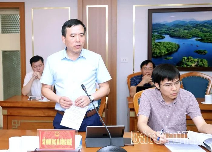 Đồng chí Nguyễn Minh Tường- TUV, Giám đốc Sở Khoa học và Công nghệ báo cáo tại hội nghị.