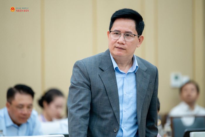 Vụ trưởng Vụ Hợp tác quốc tế, Bộ Tư pháp Nguyễn Hữu Huyên trình bày tham luận