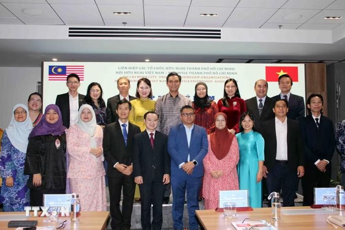 Đại diện cộng đồng người Malaysia tại Thành phố Hồ Chí Minh cùng dự buổi lễ. (Ảnh: Xuân Khu/TTXVN)