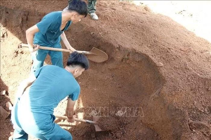 Đội K75 tổ chức khai quật tìm kiếm, quy tập hài cốt liệt sĩ tại tại thôn Đắc Thọ, xã Hoài Đức (Lâm Đồng).
