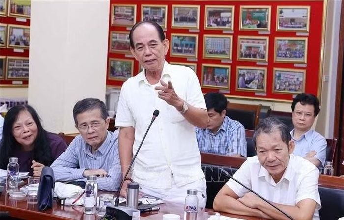 Đại biểu trình bày tham luận tại hội thảo. Ảnh: Văn Điệp/TTXVN