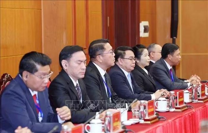 Các đồng chí cán bộ cấp Thứ trưởng và tương đương của Đảng Nhân dân Cách mạng Lào tham dự buổi tiếp. Ảnh: Phương Hoa/TTXVN