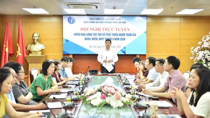 Giám đốc Bảo hiểm xã hội thành phố Hà Nội Nguyễn Ngọc Huyến phát biểu từ điểm cầu Hà Nội. (Ảnh HSS)