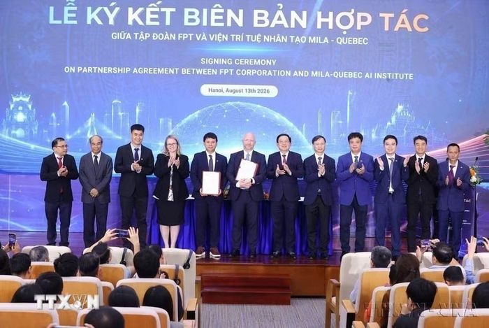 Phó Thủ tướng Hồ Quốc Dũng chứng kiến Lễ ký kết Thỏa thuận hợp tác chiến lược giai đoạn tiếp theo giữa Tập đoàn FPT và Viện Nghiên cứu Trí tuệ nhân tạo Mila (Canada), ngày 13/08/2026. (Ảnh: Văn Điệp/TTXVN)