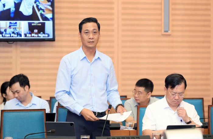 Giám đốc Sở NN&MT Hà Nội Nguyễn Thanh Nam báo cáo về tình hình mưa lũ trên sông Bùi.