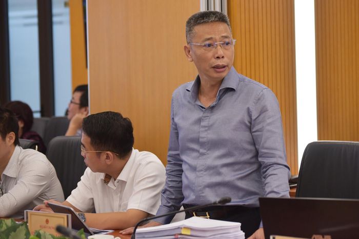 Ông Tạ Quang Vinh, Cục trưởng Cục Kết cấu hạ tầng xây dựng báo cáo tại Hội nghị.