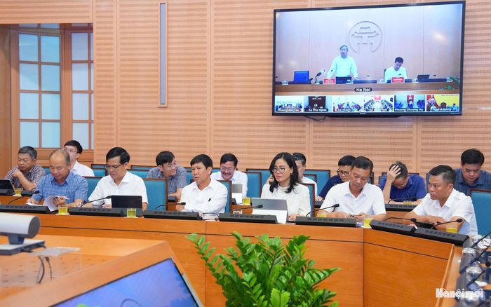 Các đại biểu tham dự hội nghị tại điểm cầu trụ sở UBND thành phố. Ảnh: Viết Thành