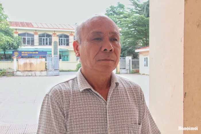 Ông Phạm Trọng Tài, người dân thôn Nội, xã Phú Xuyên tham dự chương trình tuyên truyền, phổ biến pháp luật. Ảnh: Cao Kỳ