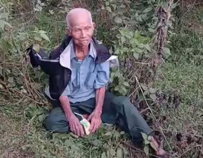 Hình ảnh ông Dụ khi được tìm thấy giữa rừng.