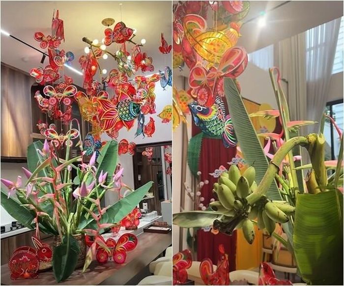 Điểm nhấn độc đáo trong không gian sống là sự kết hợp tinh tế giữa dàn lồng đèn treo trần và bình hoa chuối rừng kết hợp buồng chuối xanh mộc mạc. Sự sáng tạo đậm chất nông thôn này mang lại cảm giác gần gũi, ấm cúng nhưng vẫn đầy tính nghệ thuật cho không gian biệt thự sang trọng.