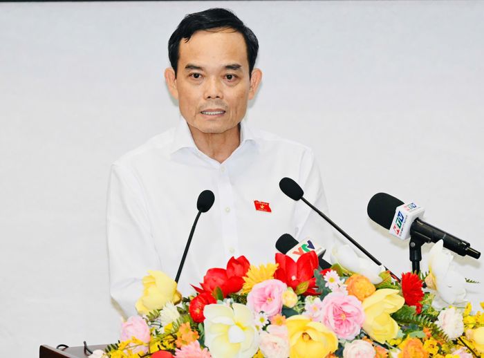 Bí thư Thành ủy TPHCM Trần Lưu Quang phát biểu tại buổi tiếp xúc cử tri. Ảnh: VIỆT DŨNG