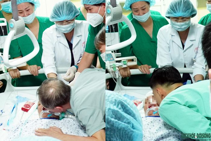Trước khi chuyển chị vào khu vực cách ly để các bác sĩ thực hiện lấy tạng, chồng và các con chị hôn tiễn biệt chị lần cuối. Ảnh: Lê Bảo