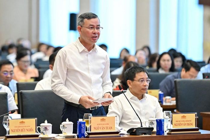 Bộ trưởng Bộ Tài chính Ngô Văn Tuấn giải trình, tiếp thu ý kiến của các đại biểu Quốc hội tại Hội nghị. Ảnh: Thủy Nguyên