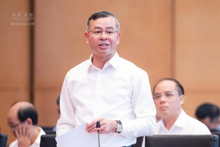 Bộ trưởng Tài chính Ngô Văn Tuấn phát biểu giải trình. Ảnh: Media QH