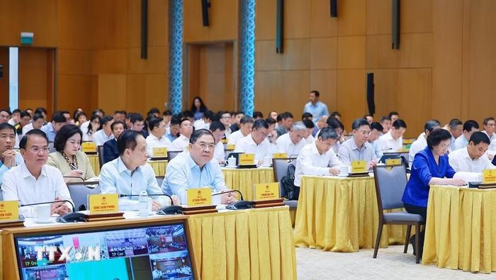 Phó Thủ tướng Thường trực Phạm Gia Túc và các đại biểu tham dự phiên họp chuyên đề về Khoa học, công nghệ và đổi mới sáng tạo và chuyển đổi số đóng góp cho phát triển kinh tế-xã hội và đánh giá kết quả công tác quý 3 năm 2026. (Ảnh: Dương Giang/TTXVN)