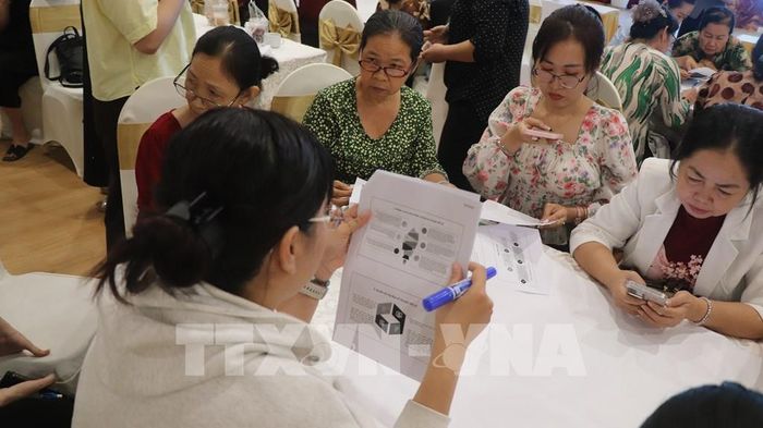 Học viên trao đổi, chia sẻ những vấn đề từ thực tiễn cơ sở. Ảnh: Nguyễn Hằng - TTXVN