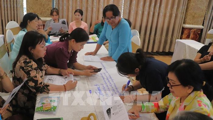 Học viên trao đổi, chia sẻ những vấn đề từ thực tiễn cơ sở. Ảnh: Nguyễn Hằng - TTXVN