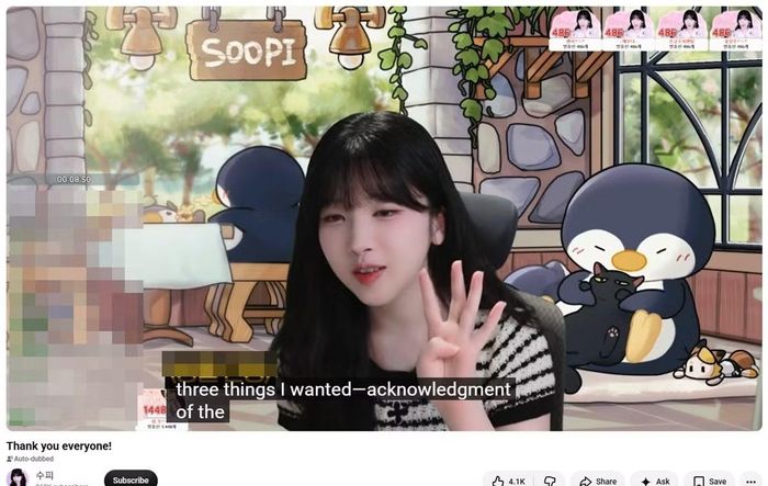Hình ảnh trong livestream của Soopi ở thời điểm cô liệt kê 3 điều mà cô mong muốn đã trở thành sự thật (phụ đề là tự động của YouTube). (Ảnh chụp màn hình).