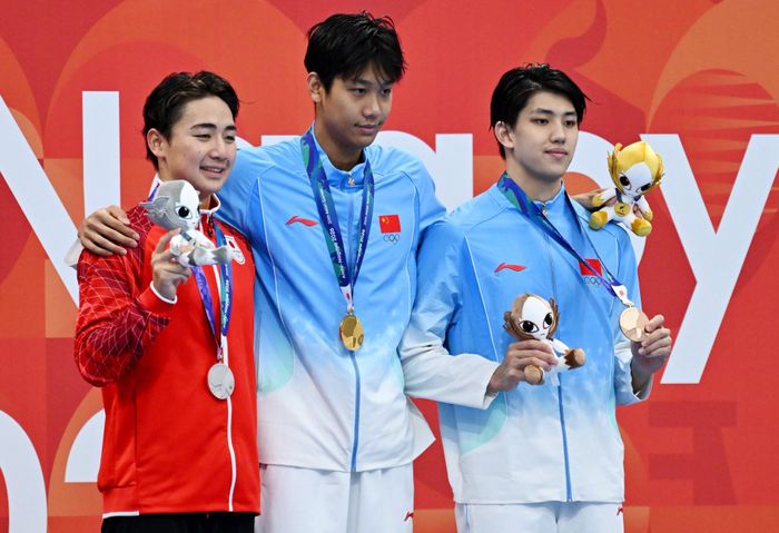  Thành tích của anh góp phần vào kỳ ASIAD thành công của đội tuyển bơi Trung Quốc, với tổng cộng 30 HCV trong 41 nội dung. Sau phần thể hiện đầy ấn tượng, cái tên Zhang Zhanshuo dần để lại dấu ấn nhiều hơn trong lòng người hâm mộ thể thao nói riêng. Ảnh: Reuters. 