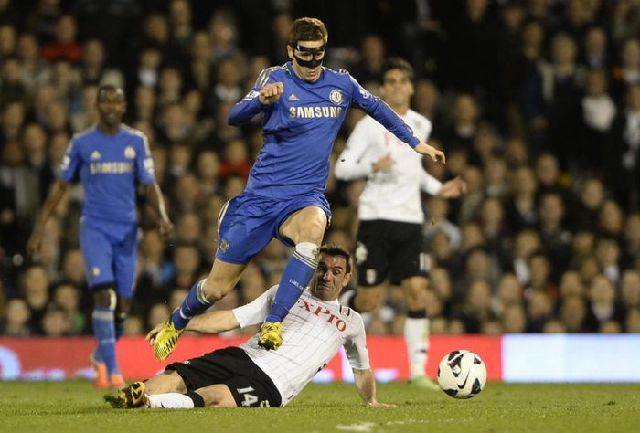  Fernando Torres đại diện cho kiểu trung phong phổ biến ở Premier League thập kỷ trước. Ảnh: Reuters. 