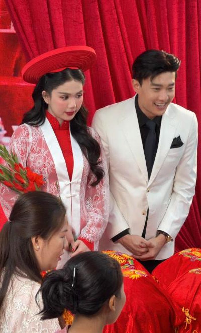 Quốc Trường và Ngọc Trinh trong hình ảnh cô dâu, chú rể.