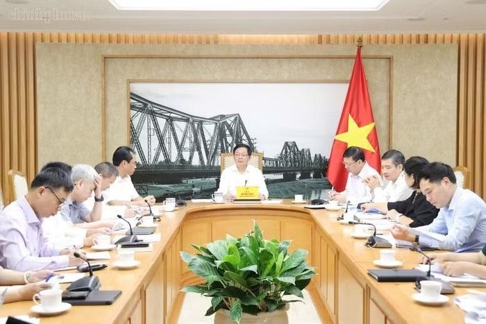 Phó Thủ tướng Hồ Quốc Dũng chủ trì cuộc họp với các bộ, cơ quan liên quan về hoàn thiện hồ sơ Dự án Luật Đất đai (sửa đổi). Ảnh: chinhphu.vn/Gia Huy
