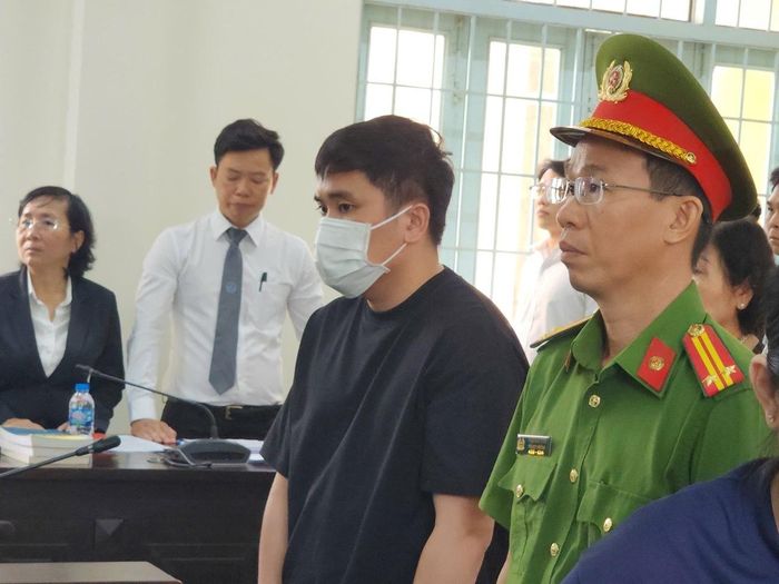 Bị cáo Trung tại phiên toà sáng nay. (Ảnh: Hoài An)