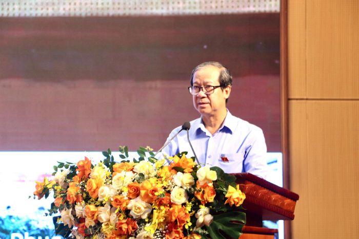 Đại biểu Nguyễn Kim Sơn, Ủy viên Trung ương Đảng, Phó Trưởng Ban Chính sách, Chiến lược Trung ương, báo cáo kết quả giải quyết, trả lời ý kiến, kiến nghị của cử tri sau kỳ họp thứ nhất. Ảnh: PN
