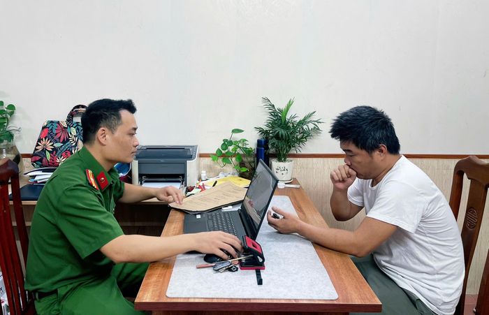 Đối tượng PhạmThanh Nghĩa tại cơ quan Công an. Ảnh: Cơ quan Công an.
