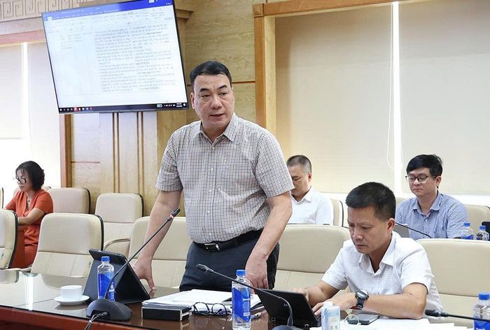 Cục trưởng Cục Khoa học Công nghệ và Đào tạo Nguyễn Ngô Quang báo cáo. Ảnh: Trần Minh
