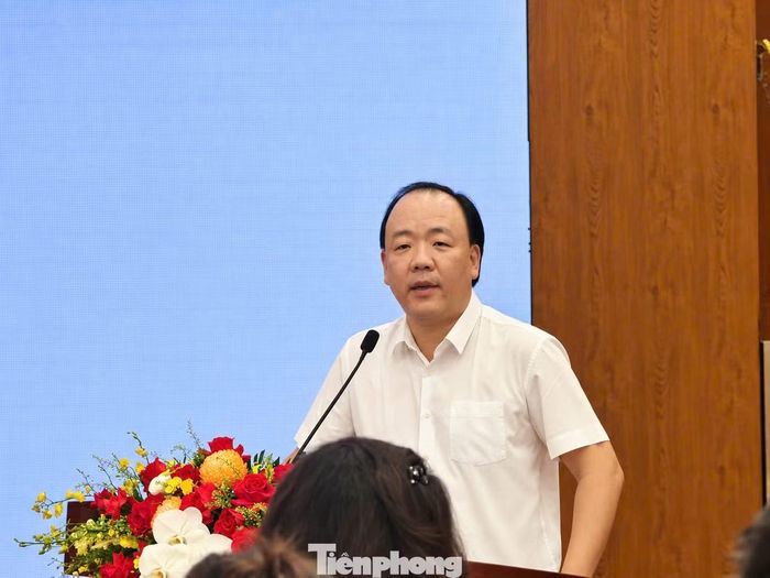 Ông Trần Hữu Linh - Cục trưởng Cục Quản lý và Phát triển thị trường trong nước - chia sẻ tại hội nghị.