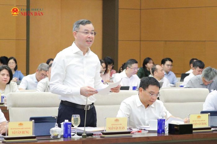 Bộ trưởng Bộ Tài chính Ngô Văn Tuấn trình bày Tờ trình dự án Luật sửa đổi, bổ sung một số điều của Luật Đầu tư