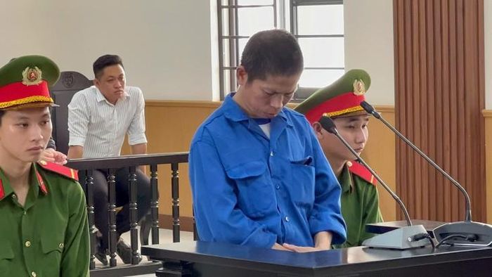 Bị cáo Nguyễn Văn Nam cúi đầu nhận tội trước tòa. Ảnh: Công an tỉnh An Giang.