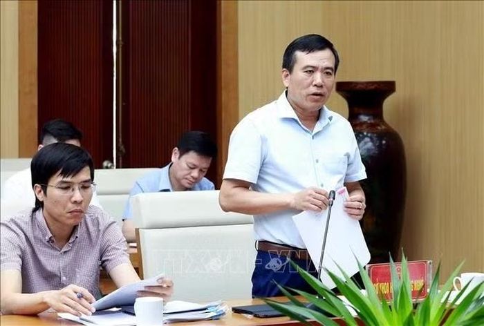 Giám đốc Sở Khoa học và Công nghệ Nguyễn Minh Tường báo cáo tại hội nghị.