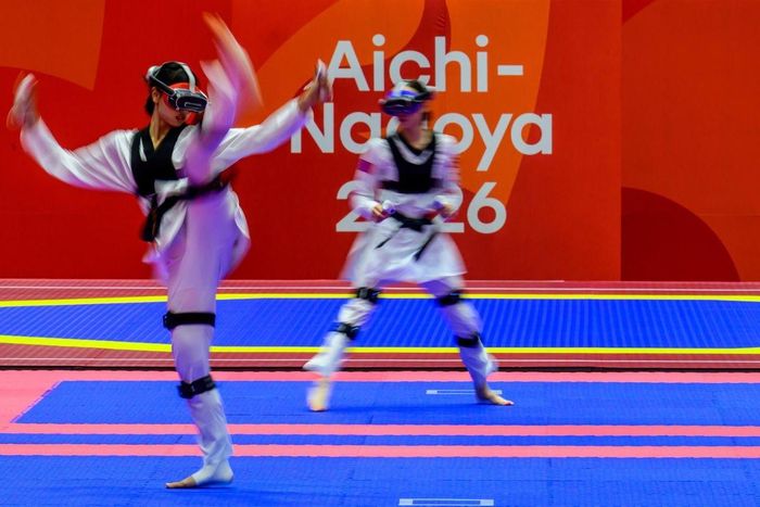  Cũng trong ngày 2/10, nhiều trận đấu của nội dung này diễn ra tại Nhà thi đấu Toyohashi. Tongchan Sasikarn của Thái Lan đánh bại Lkhagva Badam của Mông Cổ. Ở một trận đấu khác, Yap Zong Han Darren của Singapore vượt qua Asymbek Uulu Alisher của Kyrgyzstan. Ảnh: Choi Won-suk/Korea Times.