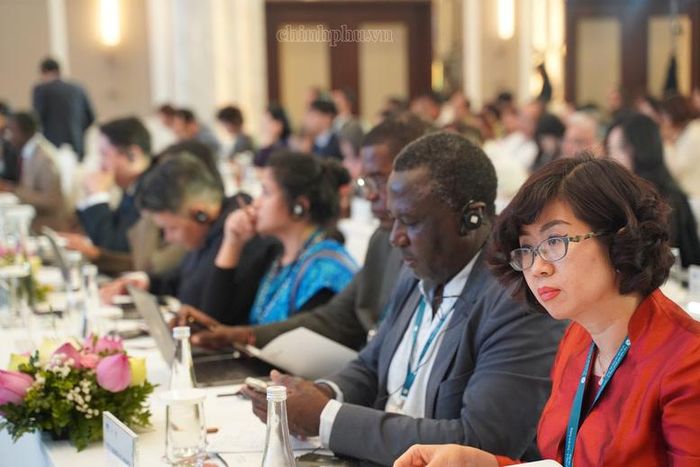 Các đại biểu dự phiên Bế mạc thông qua Văn kiện Hà Nội. Ảnh: Chinhphu.vn/Minh Anh