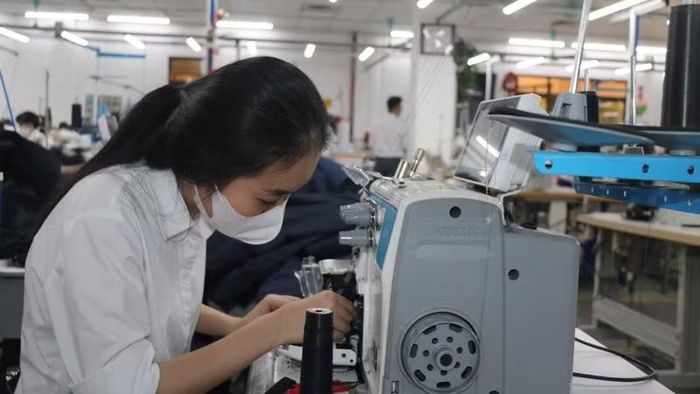 Sản xuất hàng dệt may xuất khẩu tại Tổng công ty May 10. (Ảnh: MINH ĐỨC)
