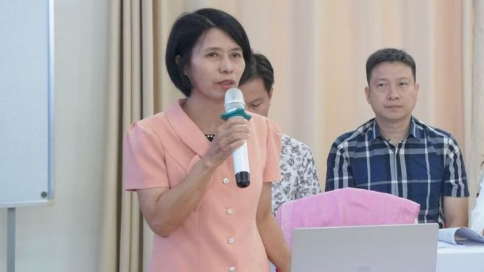 Bà Dương Thu Phương, đại diện Cục Bổ trợ Tư pháp tham luận tại hội thảo. (Ảnh: KD)