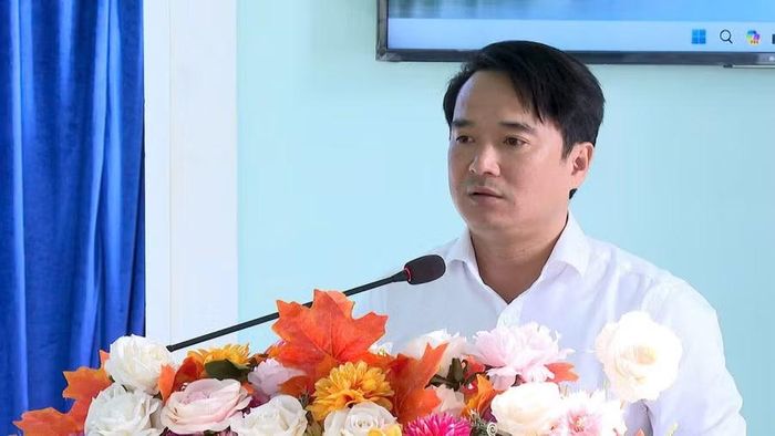 Phó Giám đốc Sở Tư pháp Đỗ Duy Nam phát biểu khai mạc ngày hội. Ảnh: Mạnh Hà