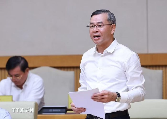 Bộ trưởng Bộ Tài chính Ngô Văn Tuấn báo cáo tình hình kinh tế-xã hội tháng 9 và 9 tháng năm 2026. (Ảnh: Dương Giang/TTXVN)